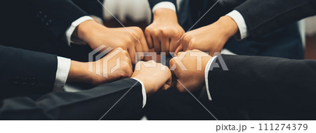 Office worker team stacking hand together symbolize successful teamwork. Shrewd 111274379