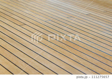Teak wood deck texture background. Wooden deck on super yacht. Yachting concept. Teak wood deck texture background. Wooden deck on super yacht. Yachting concept. 111275657