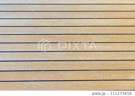 Teak wood deck texture background. Wooden deck on super yacht. Yachting concept. Teak wood deck texture background. Wooden deck on super yacht. Yachting concept. 111275658