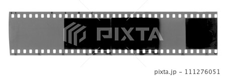Strip of old exposed celluloid film 111276051