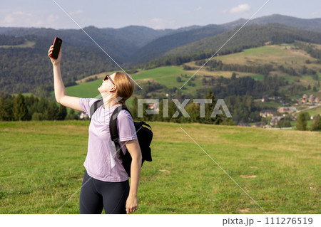 No communication coverage, lost contact signal device. Angry blonde woman tourist hiker with backpack holding smart phone searching signal. No signal cellphone network. No communication coverage, lost contact signal device. Angry blonde woman tourist hiker with backpack holding smart phone searching signal. No signal cellphone network. 111276519