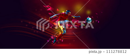 Flyer. Soccer player, man kicks ball in motion against dark red background with polygonal and fluid neon elements. Match. 111278812