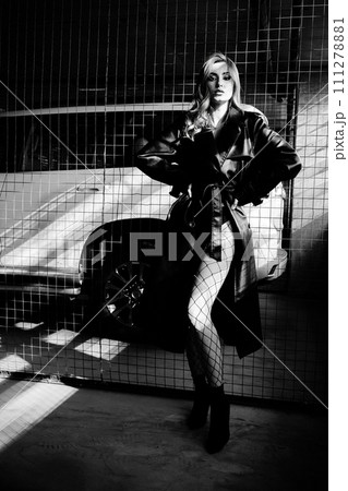 woman in leather coat woman in leather coat 111278881