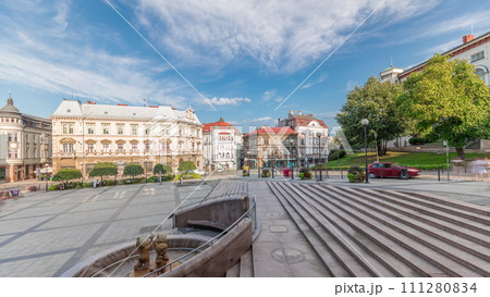 Panorama showing Sulkowski Castle and fountain on Chrobry Square in Bielsko-Biala timelapse, Poland. 111280834