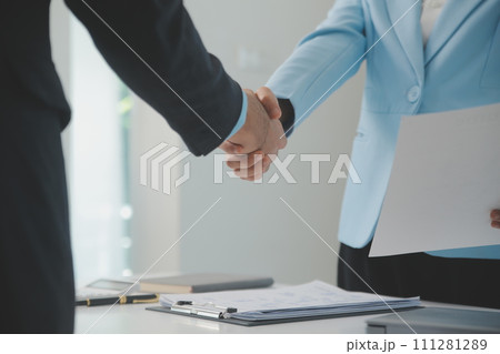 Close up view of job interview in office, focus on resume writing tips, employer reviewing good cv of prepared skilled applicant, recruiter considering application, hr manager making hiring decision Close up view of job interview in office, focus on resume writing tips, employer reviewing good cv of prepared skilled applicant, recruiter considering application, hr manager making hiring decision 111281289