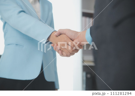 Close up view of job interview in office, focus on resume writing tips, employer reviewing good cv of prepared skilled applicant, recruiter considering application, hr manager making hiring decision Close up view of job interview in office, focus on resume writing tips, employer reviewing good cv of prepared skilled applicant, recruiter considering application, hr manager making hiring decision 111281294