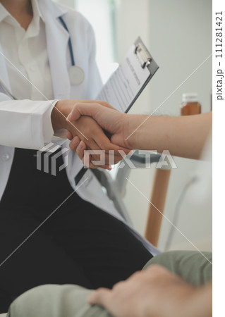 Hands of unknown woman-doctor reassuring her female patient, close-up. Medicine concept 111281421