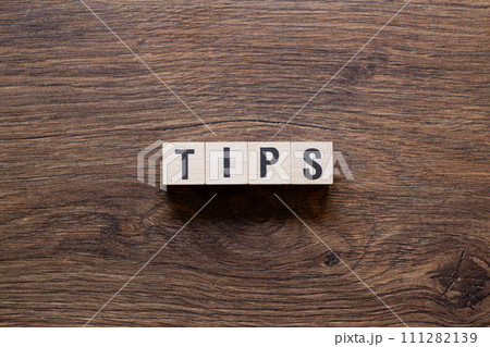 Tips - word concept on building blocks, text Tips - word concept on building blocks, text 111282139