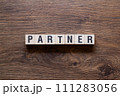 Partner - word concept on building blocks, text 111283056