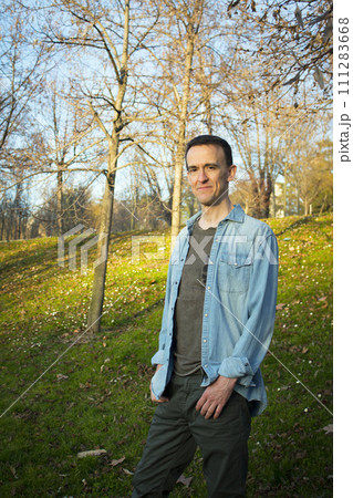 Jovial man in positive and calm attitude 111283668