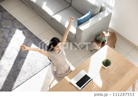 Happy Asian girl enjoying business achievement, education success Happy Asian girl enjoying business achievement, education success 111287553