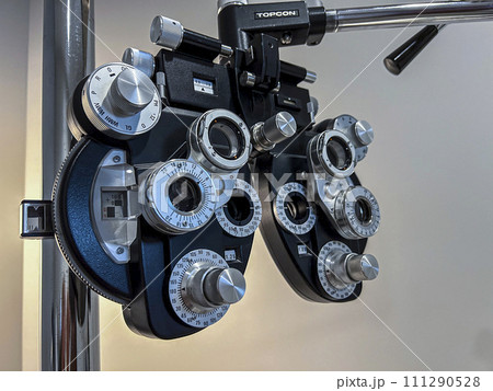 Phoropter or ophthalmoscope equipment macro. Phoropter or ophthalmoscope equipment macro. 111290528