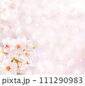 桜の花と舞い散る花びら（春イメージ背景素材） 111290983