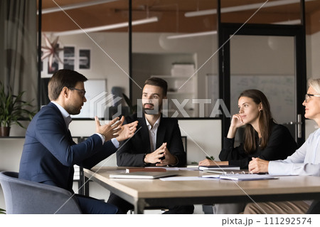 Project manager man speaking on business team brainstorming meeting Project manager man speaking on business team brainstorming meeting 111292574
