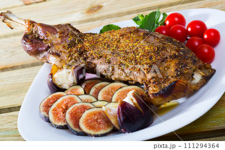 Lamb hind quarter baked in oven Lamb hind quarter baked in oven 111294364