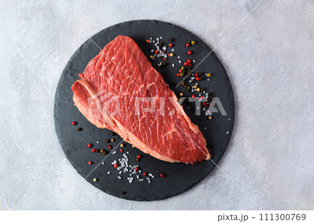 Raw fresh marbled meat and seasonings on grey background top view 111300769