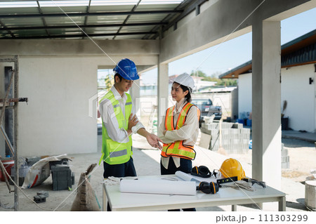 team engineer, foreman, architect meeting for colleagues discussing and checks construction blueprints at onsite team engineer, foreman, architect meeting for colleagues discussing and checks construction blueprints at onsite 111303299
