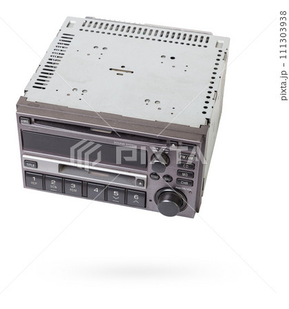 an media audio system and a radio in gray and black plastic of car with cd and mp3 music on white isolated background an media audio system and a radio in gray and black plastic of car with cd and mp3 music on white isolated background 111303938