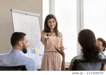 Happy young business trainer, mentor woman training workers Happy young business trainer, mentor woman training workers 111309070