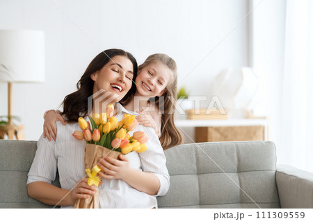 daughter and mom with flowers daughter and mom with flowers 111309559