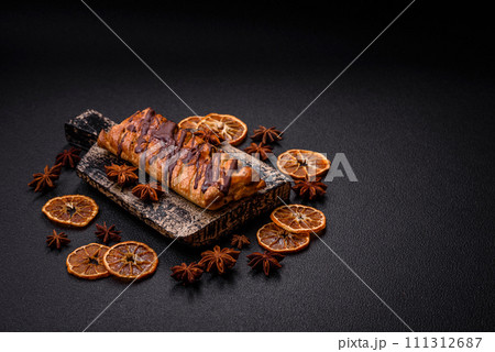 Delicious crispy sweet puff pastry with chocolate and salted caramel Delicious crispy sweet puff pastry with chocolate and salted caramel 111312687