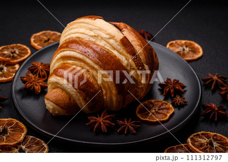 Delicious crispy sweet croissant cornet with chocolate Delicious crispy sweet croissant cornet with chocolate 111312797