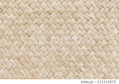 Pattern of reed weaving mat with vintage style for background and design art work. Pattern of reed weaving mat with vintage style for background and design art work. 111313673
