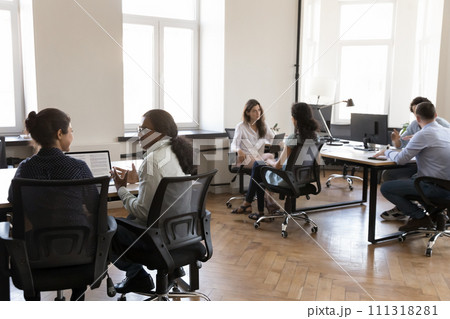 Pairs of diverse business colleagues working in modern office space 111318281