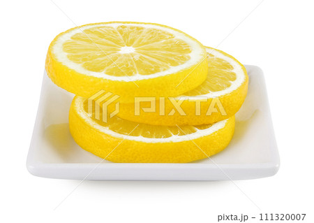 Ripe lemon slices in ceramic bowl isolated on white background with full depth of field. Ripe lemon slices in ceramic bowl isolated on white background with full depth of field. 111320007