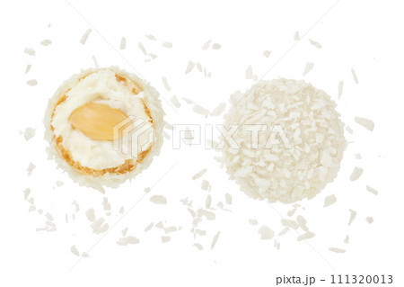 round candy raffaello with coconut flakes and nut isolated on white background. Top view. Flat lay. 111320013