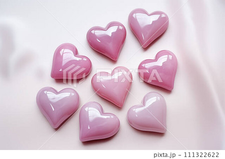 AI-generated content. Glossy pink hearts on a smooth white surface. 111322622