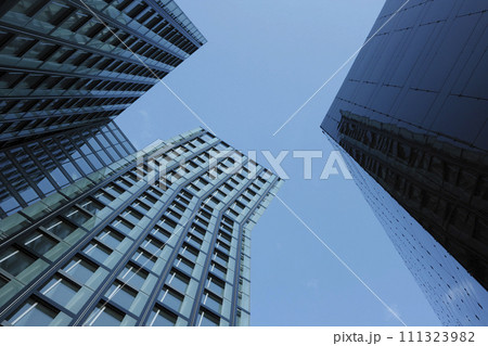 Modern office building in Hamburg by architect Hadi Teherani. Dancing towers beside in Reeperbahn in Hamburg. Elements of modern architecture.	 111323982