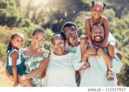 Face portrait of family in nature park, parents in garden with children and senior people with smile on group walk in summer. Smile, happy and African kids in green yard with mother and father 111327937