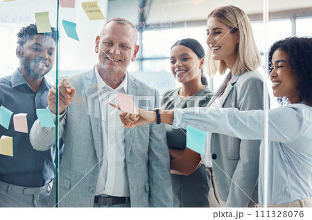 Business people planning on sticky note in meeting, post it paper for creative advertising idea and team collaboration for marketing project. Teamwork for global company strategy on glass in office 111328076