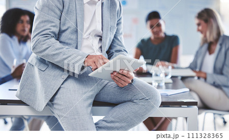 Corporate meeting, man and typing on tablet in business team office seminar workshop break. Professional male on digital communication gadget to check email or write notes about discussion. 111328365
