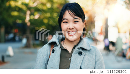 Japan businesswoman, face and happy in city for company travel and street for ambition or startup entrepreneur. Portrait, person and smile for summer trip for career growth and job pride in kyoto 111329302