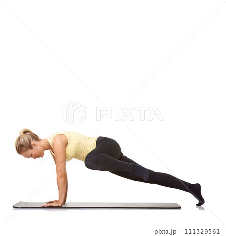 Woman, pilates and mat in studio for push ups, fitness or workout for healthy body, wellness or core muscle. Person, exercise or yoga on floor for abdomen health on mockup space or white background 111329561