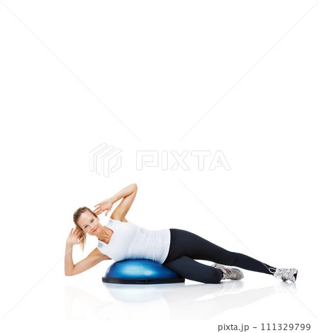Portrait of woman, bosu ball or balance in studio or core workout isolated on white background. Female athlete, training equipment or fitness for mockup space, body challenge or exercise for wellness 111329799