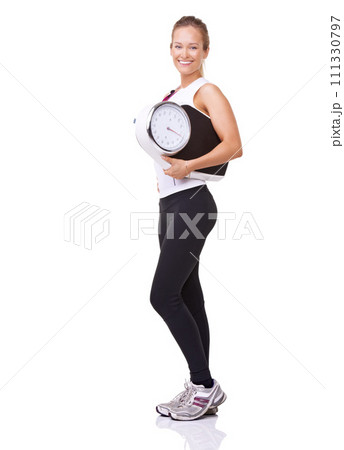 Fitness, scale and portrait of woman with smile, workout and wellness with healthy pride in studio. Health, exercise and body of happy girl with weight loss measurement isolated on white background. Fitness, scale and portrait of woman with smile, workout and wellness with healthy pride in studio. Health, exercise and body of happy girl with weight loss measurement isolated on white background. 111330797