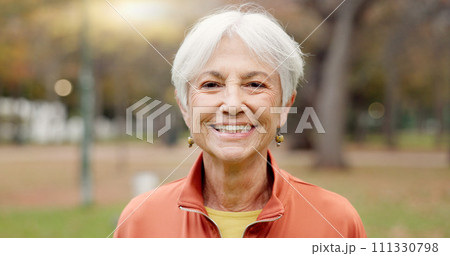 Senior woman with a smile, portrait in the park and happiness in nature, woods or outdoor for a walk in retirement. Happy, face and elderly person with wellness from exercise or healthy workout Senior woman with a smile, portrait in the park and happiness in nature, woods or outdoor for a walk in retirement. Happy, face and elderly person with wellness from exercise or healthy workout 111330798