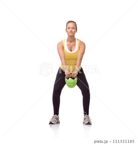 Workout, portrait or studio woman with kettlebell swing for muscle growth, strong arm strength or heavy weight lifting. Exercise equipment, gym circuit routine or bodybuilder girl on white background 111331185