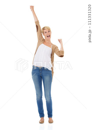 Happy woman, portrait and fist pump in celebration for good news or winning on a white studio background. Young female person, model or blonde smile for achievement, promotion or deal on mockup space 111331320