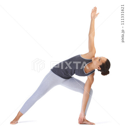 Yoga, stretching and young woman on a white background for fitness, workout and exercise with holistic wellness or muscle health. Flexible, young person with pilates practice and balance in studio Yoga, stretching and young woman on a white background for fitness, workout and exercise with holistic wellness or muscle health. Flexible, young person with pilates practice and balance in studio 111331621