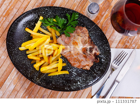 Fried pork with potatoes Fried pork with potatoes 111331787