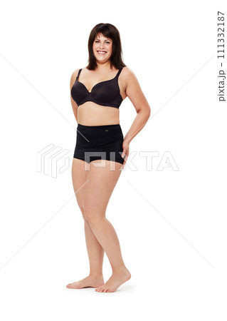 Portrait, smile and plus size woman in underwear in studio isolated on a white background mockup space. Happy person, model and body positivity, health and natural beauty of confident young girl Portrait, smile and plus size woman in underwear in studio isolated on a white background mockup space. Happy person, model and body positivity, health and natural beauty of confident young girl 111332187