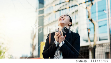 Businesswoman, cellphone and excited in city street for celebration, achievement or congratulations. Asian person, good news and urban employment or promotion in Tokyo or career, professional or joy Businesswoman, cellphone and excited in city street for celebration, achievement or congratulations. Asian person, good news and urban employment or promotion in Tokyo or career, professional or joy 111332205