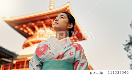 Woman, shinto temple and traditional clothes in culture, building or religion with vision for zen balance. Japanese person, idea and buddhism in faith, mindfulness or thinking with low angle in Kyoto 111332346
