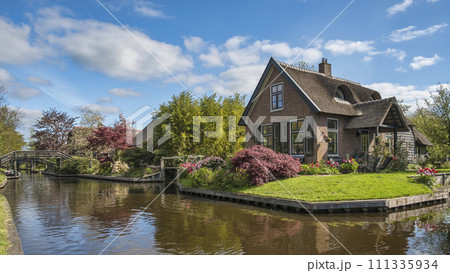 Giethoorn Netherlands, panorama city skyline at canal and traditional house in Giethoorn village Giethoorn Netherlands, panorama city skyline at canal and traditional house in Giethoorn village 111335934