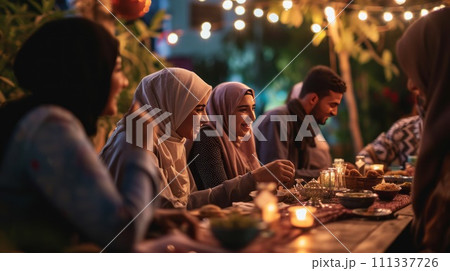 Arabian family eating iftar in Ramadan. Break fasting during Ramadan. Arabian family eating iftar in Ramadan. Break fasting during Ramadan. 111337726