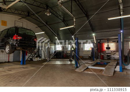 Car in automobile repair service center. 111338915